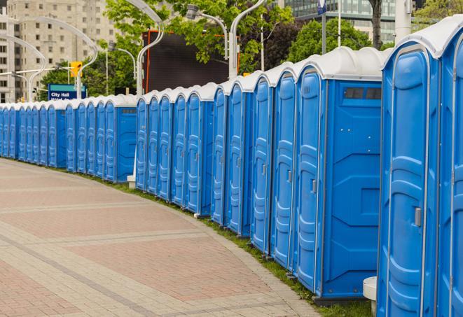 a line of portable restrooms at an outdoor wedding, catering to guests with style and comfort in Bradbury, CA